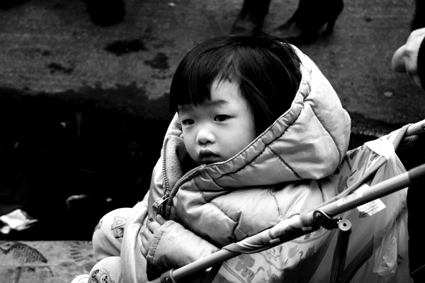 Child in Stroller : Chinatown : Catherine Kirkpatrick Photography
